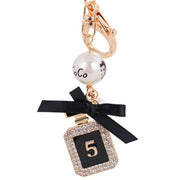perfume bottle shaped gold keychain, view 5 - MRSLM
